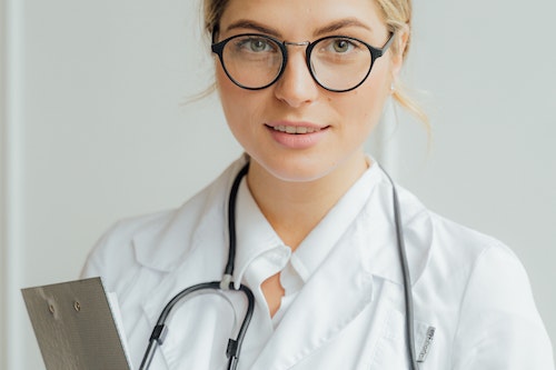 Doctor holding a clipboard.