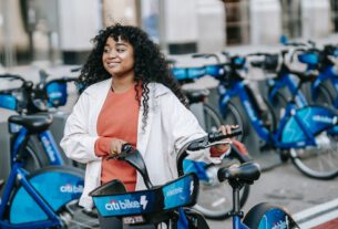 Woman taking Mobility-as-a-Service ridesharing E-bike